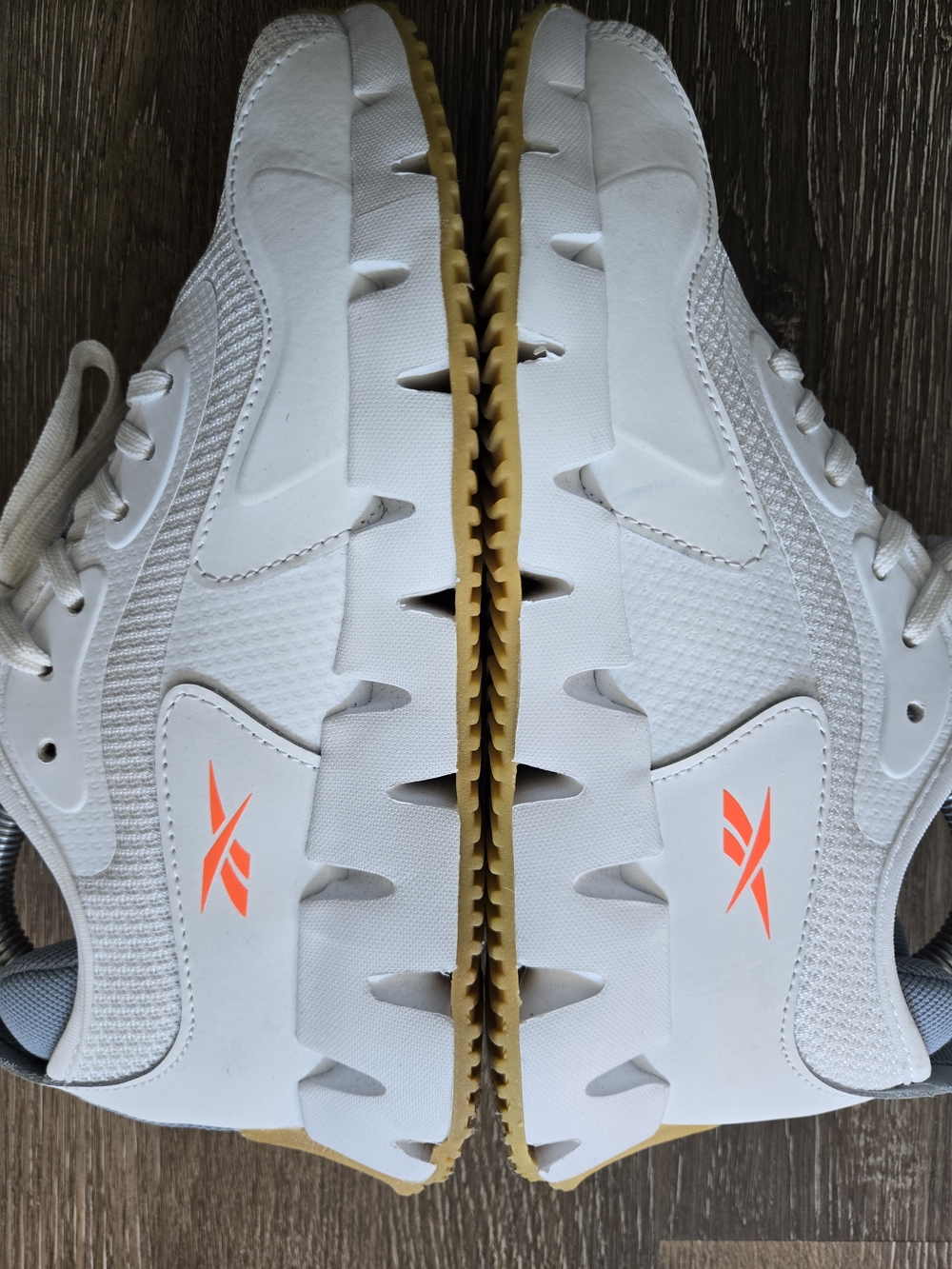 Reebok Women's White Athletic Sneakers with Orange Accent